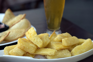 Happy hour: fried cassava and very cold beer