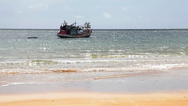 Boats in the tropical sea near the beach