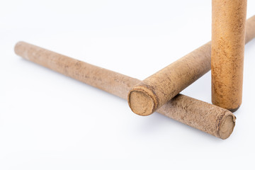 Ebonite sticks on white background. Also is known as hard rubber or vulcanite
