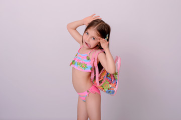  Caucasian little girl in swimsuit. Fanny portrait