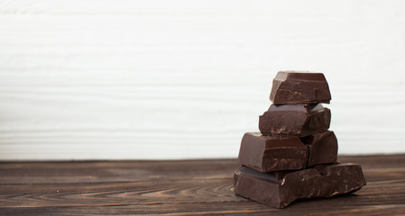 Chocolate parts on white background