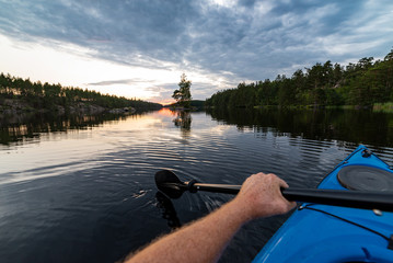 Kayaking in sunset - obrazy, fototapety, plakaty