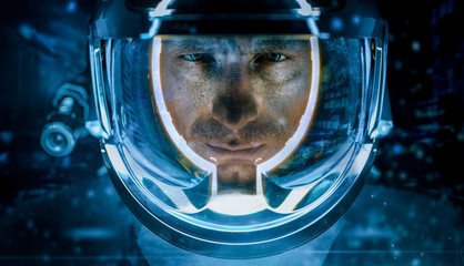 Man in glowing spacesuit helmet © EgoR