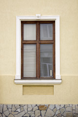 Photo of old single window on old wall