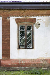 A window with a lattice of an ancient building