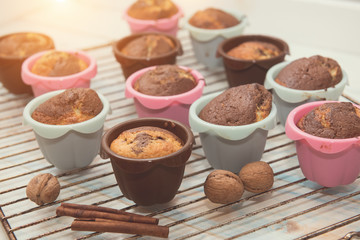 Cooked baked cupcakes in silicone shape on the grill. Selective focus