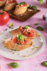 Traditional italian bruschetta on bright background