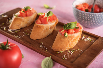 Traditional italian bruschetta on bright background