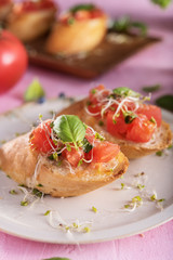 Traditional italian bruschetta on bright background