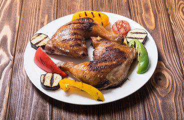 Grilled chicken legs with vegetables