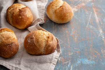 Fresh bread on stone table. Top view with space for your text