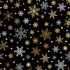 Christmas seamless pattern of snowflakes, yellow and light blue on black background.