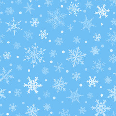 Christmas seamless pattern of snowflakes, white on light blue background.