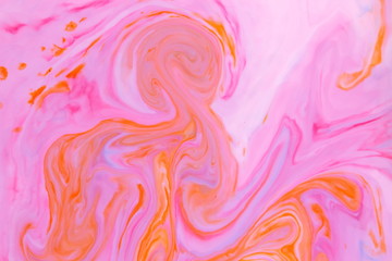 Orange pink abstract background, pink water droplets, multicolored pattern, food colors in milk,...