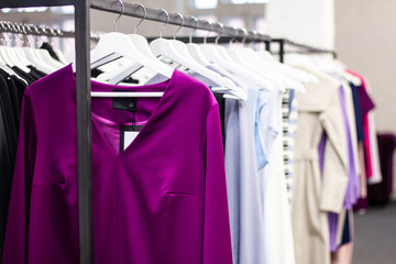 Clothing on hanger at the modern shop boutique