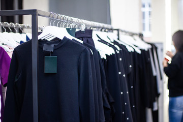 Obraz premium Clothing on hanger at the modern shop boutique