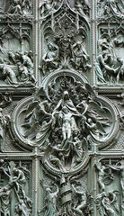 Bronze door of Milan Cathedral, depicting death of Jesus, Italy