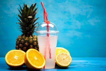 Healthy exotic drink of oranges and pineapples