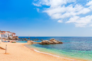 Sea landscape with Calella de Palafrugell, Catalonia, Spain near of Barcelona. Scenic fisherman village with nice sand beach and clear blue water in nice bay. Famous tourist destination in Costa Brava