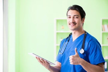 Young doctor working in the hospital