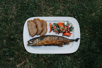 Grilled mackerel with 100% rie bread slices and tomato salad with feta cheese and organic basil...