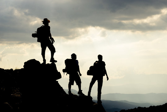 mountain climbing team with spectacular mountain views