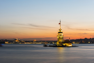 Fototapeta na wymiar Romantic Istanbul Sunset Landscape. Istanbul Bosphorus and Maiden's Tower view with beautiful blue romantic sky. Istanbul, Turkey..