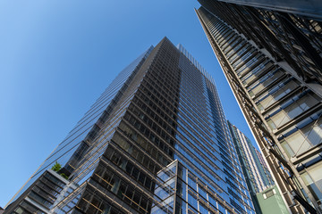 Obraz premium New York City / USA - JUL 13 2018: Looking up view of The New York Times Building in midtown Manhattan