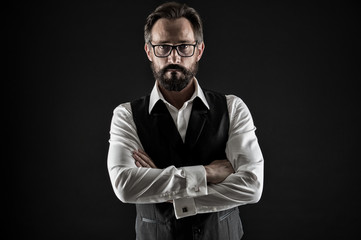 Senior businessman. Senior businessman in glasses keep arms crossed. Senior businessman with serious look. Senior boss with beard on unshaven face, vintage filter. businessman.