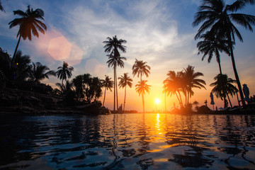 Fototapeta na wymiar Amazing sunset on a tropical sea beach.