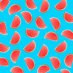 Blue background with slices of watermelon