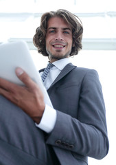 closeup .businessman working on the tablet.