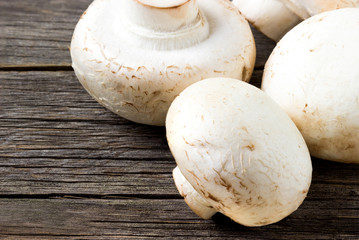 Champignons on a wooden table.