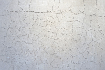 white grey cracking stucco dry wall surface background