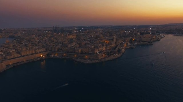 High Aerial shot moving towards Valletta