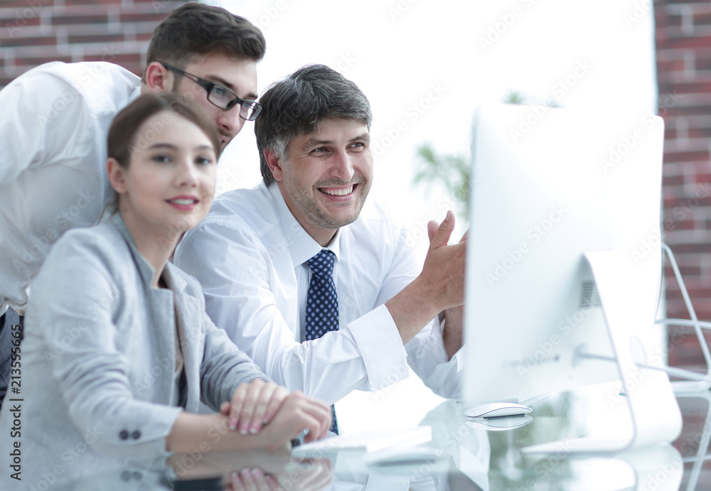 Poster business team discussing information sitting at the desk