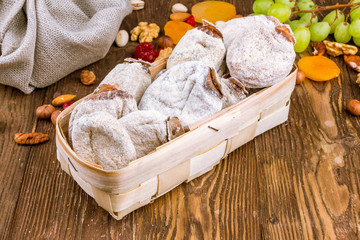 Dried persimmon on wooden background