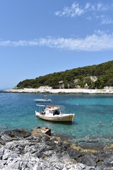 Fototapeta na wymiar Adriatic sea Croatian seascape with island and boats, Hvar Island, Dalmatian Coast, Croatia