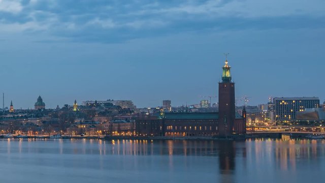 Stockholm city skyline day to night time lapse at Stockholm City Hall, Stockholm Sweden 4K Time Lapse