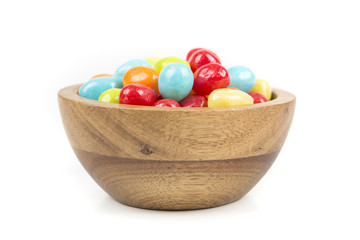 Pile of chewy multicolored shiny gummy candy beans