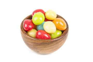 Pile of chewy multicolored shiny gummy candy beans