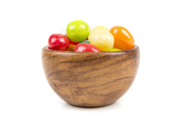 Pile of chewy multicolored shiny gummy candy beans