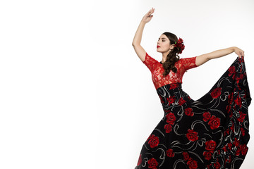 spanish girl flamenco dancer on a light background. free space for your text - obrazy, fototapety, plakaty