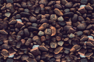 pebble texture on the riverbank, gravel abstract texture background.