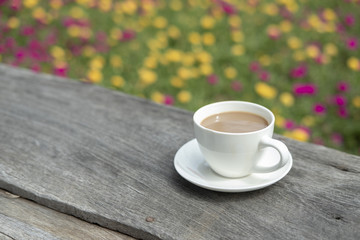 white ceramic coffee cup in the nature