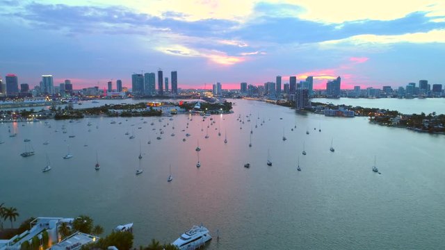 Beautiful aerial drone shot Miami approaching Watson Island views of Downtown Miami