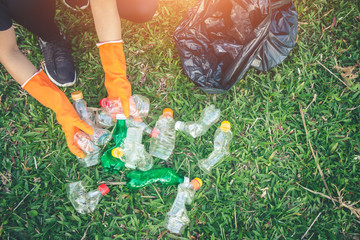 Women volunteer help garbage collection charity environment.