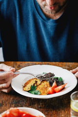 Man vegetarian eats healthy food healthy lifestyle concept
