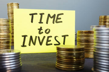 Time to invest. Money and memo stick.