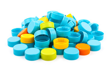 Colorful Plastic bottle caps on white background.